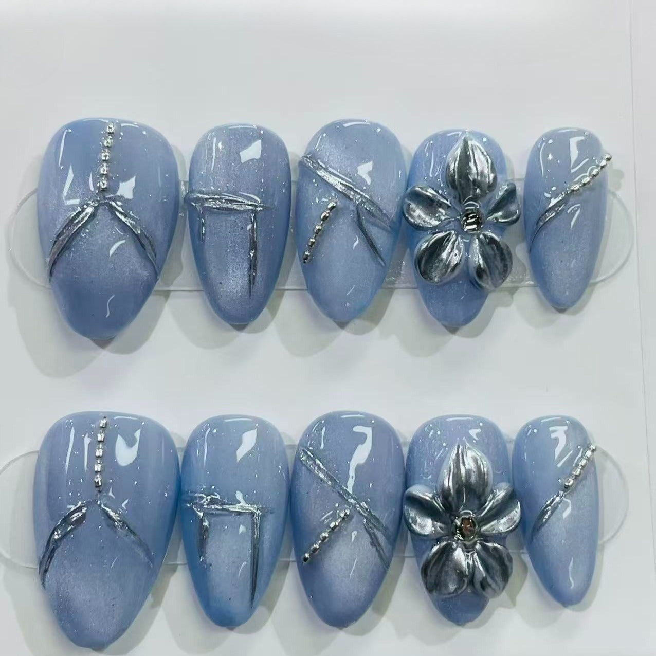 More to save up to 60% Blue Press On Nails Silver 3D Flower Design